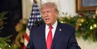 O presidente dos EUA, Donald Trump, discursa na Casa Branca, em 17 de dezembro de 2025, em Washington.  Foto: &copy; Doug Mills / POOL/AFP / RFI
