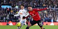 Matheus Cunha celebra o seu gol, o do empate do United contra o Leeds. Foto: Michael Regan/Getty Images / Jogada10