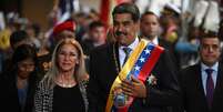 O presidente venezuelano Nicol&aacute;s Maduro e sua esposa Cilia Flores, em 15 de janeiro de 2025, em Caracas.  Foto: AFP - FEDERICO PARRA / RFI
