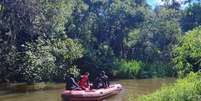 Corpo de crian&ccedil;a &eacute; localizado no Rio Tiet&ecirc;.  Foto: Divulga&ccedil;&atilde;o/Corpo de Bombeiros / Estad&atilde;o