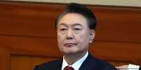Yoon, um ex-promotor que governou o pa&iacute;s de 2022 at&eacute; 2025, &eacute; alvo de mais sete a&ccedil;&otilde;es em curso.  Foto: DW / Deutsche Welle
