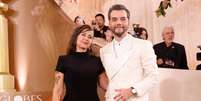 Wagner Moura e a esposa, Sandra Delgado, no Globo de Ouro  Foto: Taylor Hill/FilmMagic
