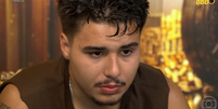 Pedro no confessionário após desistir do BBB26  Foto: Reprodução/Globo