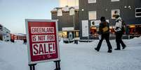 'A Groenlândia não está à venda!', diz a placa em Nuuk, capital da Groenlândia  Foto: AFP / BBC News Brasil