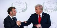 O presidente da França, Emmanuel Macron, e o norte-americano Donald Trump  Foto: Michael Kappeler/picture alliance via Getty Images