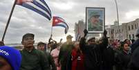 Cubanos marcham diante da Embaixada dos EUA em Havana  Foto: ANSA / Ansa - Brasil