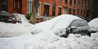 Carros cobertos de neve em Nova York  Foto: ANSA / Ansa - Brasil