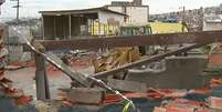 Muro desabou e resultou na morte de uma crian&ccedil;a em Itapevi  Foto: Reprodu&ccedil;&atilde;o Brasil Urgente/TV Bandeirantes / Estad&atilde;o