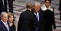 Donald Trump e Obama durante funeral de Jimmy Carter, no ano passado  Foto: Getty Images
