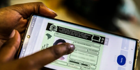Carteira de motorista digital pode ser acessada via aplicativo  Foto: Marcello Casal Jr./Ag&ecirc;ncia Brasil