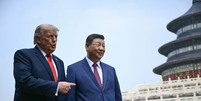 XI Jinping e Donald Trump durante reunião em Pequim  Foto: Brendan Smialowski / AFP
