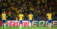 David Luiz, Ramires, Luiz Gustavo e Dante, do Brasil, demonstram des&acirc;nimo ap&oacute;s sofrerem um gol durante a partida entre Brasil e Alemanha na Copa 2014 - Foto: Laurence Griffiths/Getty Images / Jogada10