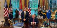 Fl&aacute;vio Bolsonaro se encontrou com Trump na Casa Branca dois dias antes do an&uacute;ncio de Washington sobre PCC e CV  Foto: Reprodu&ccedil;&atilde;o/Instagram/@flaviobolsonaro / BBC News Brasil