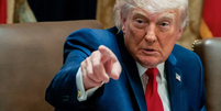 Donald Trump em seu gabinete em Washington  Foto: Evan Vucci / Reuters