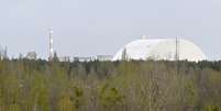 Local de conten&ccedil;&atilde;o da usina de Chernobyl, onde um dep&oacute;sito de combust&iacute;vel nuclear foi atingido por um ataque russo, neste domingo, 7 de junho.  Foto: AFP - SERGEI SUPINSKY / RFI