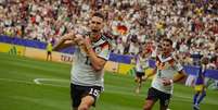 Schlotterbeck vibra ap&oacute;s fazer o segundo gol da goleada por 7 a 1 sobre Cura&ccedil;ao.  Foto: Divulga&ccedil;&atilde;o / DFB / Jogada10