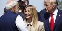 Giorgia Meloni e Donald Trump cumprimentam Narendra Modi no G7  Foto: ANSA / Ansa - Brasil