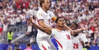 Divulgação / The FA - Legenda: Kane comemora um dos gols da Inglaterra com Bellingham Foto: Jogada10