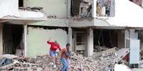 População tenta escapar de escombros após terremotos na Venezuela  Foto: ANSA / Ansa - Brasil