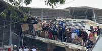 Venezuelanos saqueiam loja atingida por terremoto em Catia La Mar  Foto: ANSA / Ansa - Brasil