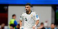 Ali Lajami (Ar&aacute;bia Saudita) durante jogo contra a Espanha, no dia 21.06.2026. Foto: Associated Press / Alamy