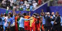 Jogadores do Congo celebram classifica&ccedil;&atilde;o para a segunda fase&nbsp; Foto: Molly Darlington/Getty Images / Jogada10