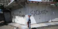 Den&uacute;ncias de saques por militares e policiais na Venezuela t&ecirc;m crescido nas &uacute;ltimas horas  Foto: ANSA / Ansa - Brasil