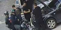 Policial civil reagiu a falso an&uacute;ncio de assalto que seria 'brincadeira'  Foto: Reprodu&ccedil;&atilde;o/TV Globo / Estad&atilde;o