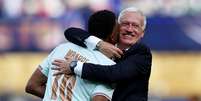 Mbapp&eacute; e Deschamps em jogo da Copa do Mundo  Foto: Tullio Puglia - FIFA/FIFA via Getty Images