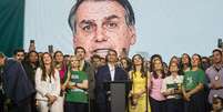 V&iacute;deo do ex-presidente Jair Bolsonaro feito por intelig&ecirc;ncia artificial foi apresentado na conven&ccedil;&atilde;o do PL  Foto: TABA BENEDICTO/ESTAD&Atilde;O CONTE&Uacute;DO