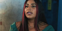 Let&iacute;cia Souza Santos, de 33 anos, ficou submersa na vala e foi resgatada pelos bombeiros Foto: Reprodu&ccedil;&atilde;o/Instituto Quer&ocirc;