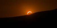 Eclipse em G&ecirc;nova, na Lig&uacute;ria, regi&atilde;o italiana que recebeu 94,8% de cobertura  Foto: ANSA / Ansa - Brasil