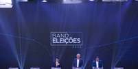 Augusto Cury (Avante), Renan Santos (Missão) e Ronaldo Caiado (PSD), candidatos à Presidência da República nas eleições 2026, participam do primeiro debate promovido pela TV Band em parceria com o Estadão  Foto: Daniel Teixeira/Estadao / Estadão