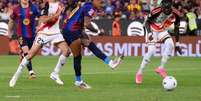 Raphinha&nbsp; comemora ao lado de Lamine Yamal. Brasileiro fez dois na vit&oacute;ria sobre o Rayo e &eacute; o artilheiro do Espanhol.&nbsp; Lamine tamb&eacute;m fez dois.  Foto: &nbsp; David Ramos/Getty Images / Jogada10