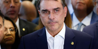 Relat&oacute;rio indica que rela&ccedil;&atilde;o entre Fl&aacute;vio Bolsonaro e Vorcaro n&atilde;o terminou na data divulgada por ele  Foto: Wilton Junior/Estad&atilde;o Conte&uacute;do