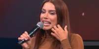 Anitta atuando como conselheira durante o Estrelas da Casa  Foto: Reprodu&ccedil;&atilde;o | Globoplay