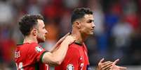 R&uacute;ben Neves e Cristiano Ronaldo pela sele&ccedil;&atilde;o &ndash;  Foto: Justin Setterfield/Getty Images / Jogada10