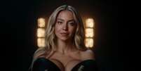 Sydney Sweeney protagoniza propaganda de bet em que posa nua com objetos esportivos e gera protesto de atletas  Foto: Reprodução/@novig via X / Estadão