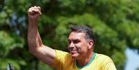 Fl&aacute;vio Bolsonaro durante campanha em Santa Barbara D&acute;Oeste  Foto: Alexandre Meneghini / Reuters