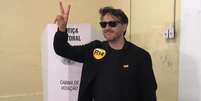 O candidato à presidência pelo Missão, Renan Santos, votou na manhã deste domingo (4) em uma escola estadual da Zona Sul de São Paulo.  Foto: Reprodução/Globo News / Estadão
