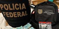 PF apreendeu dinheiro em espécie, um celular e um pen drive   Foto: Divulgação/Polícia Federal 