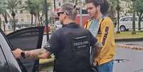 Enzo Ricardo Verzani foi preso em flagrante nesta quarta-feira, 7, durante o cumprimento de um mandado de busca e apreens&atilde;o em Santos (SP)  Foto: Reprodu&ccedil;&atilde;o/Balan&ccedil;o Geral/Record 