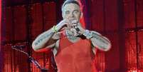O cantor Robbie Williams durante show em S&atilde;o Paulo, 2026  Foto: Igor Miranda / Rolling Stone Brasil
