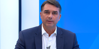 Flávio Bolsonaro em entrevista à Globo  Foto: Reprodução/Globo