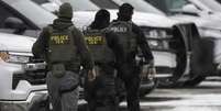 Policiais do servi&ccedil;o de imigra&ccedil;&atilde;o dos Estados Unidos (ICE) em Minneapolis, em 4 de fevereiro de 2026. (Imagem ilustrativa)  Foto: &copy; Getty Images via AFP/John Moore / RFI