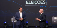 Fl&aacute;vio Bolsonaro e Lula no primeiro debate na Band  Foto: Reprodu&ccedil;&atilde;o/Band