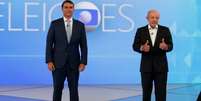 Lula e Fl&aacute;vio Bolsonaro no debate na Globo: veja os pontos altos de cada candidato  Foto: Divulga&ccedil;&atilde;o / Perfil Brasil