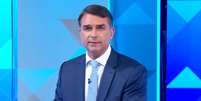 Fl&aacute;vio Bolsonaro faz considera&ccedil;&otilde;es finais em debate da Globo  Foto: Reprodu&ccedil;&atilde;o/Globo