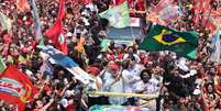 O presidente Lula (PT) em ato em Copacabana neste s&aacute;bado, 24  Foto: Wagner Meier/Getty Images