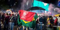 Apoiadores de Lula (PT) fazem festa na Avenida Paulista, em S&atilde;o Paulo, ap&oacute;s a reelei&ccedil;&atilde;o do petista  Foto: VINCENT BOSSON/FOTOARENA/ESTAD&Atilde;O CONTE&Uacute;DO